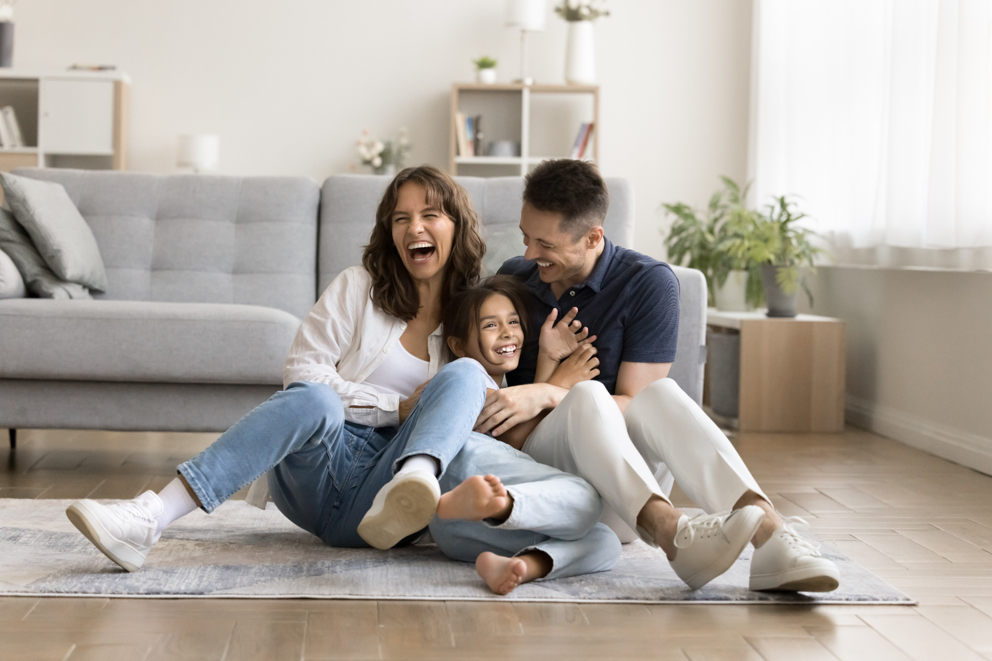 Smiling parents with child